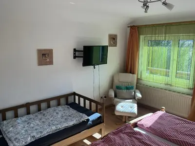 Ein Bett oder Betten in einem Zimmer der Unterkunft TOM’s Appartment