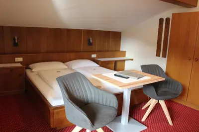 Ein Bett oder Betten in einem Zimmer der Unterkunft Haus Anni