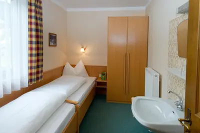 Ein Bett oder Betten in einem Zimmer der Unterkunft Ferienhaus Birkenweg