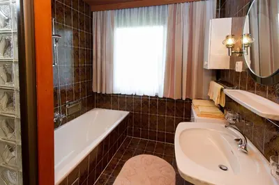 Ein Badezimmer in der Unterkunft Ferienhaus Birkenweg