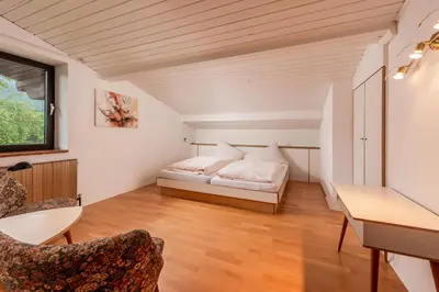 Ein Bett oder Betten in einem Zimmer der Unterkunft Landhaus Blaubeerhügel