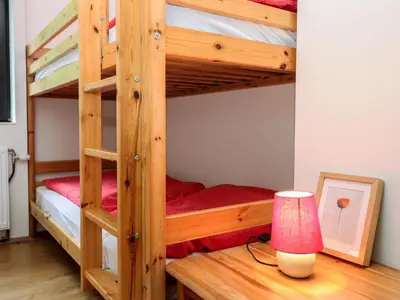 Ein Bett oder Betten in einem Zimmer der Unterkunft Apartment Spatzennest - Top 7 by Interhome