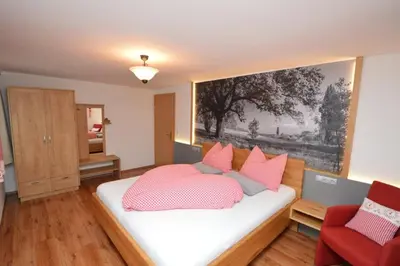 Ein Bett oder Betten in einem Zimmer der Unterkunft Urlaub am Ziegenhof 