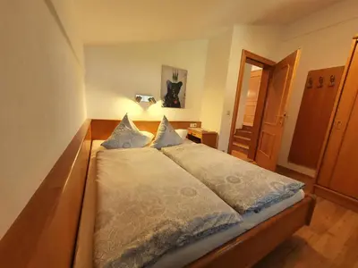 Ein Bett oder Betten in einem Zimmer der Unterkunft Apartment Maier