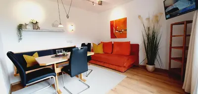 Ein Sitzbereich in der Unterkunft Apartment Maier