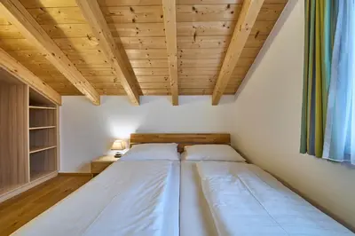 Ein Bett oder Betten in einem Zimmer der Unterkunft Ferienwohnung Paula