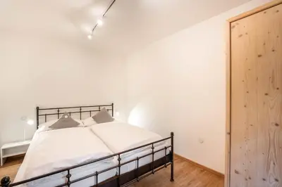 Ein Bett oder Betten in einem Zimmer der Unterkunft Ferienhaus zur Hackenschmiede