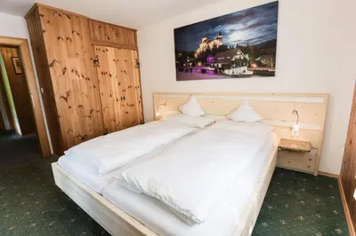 Ein Bett oder Betten in einem Zimmer der Unterkunft Ferienhaus zur Hackenschmiede