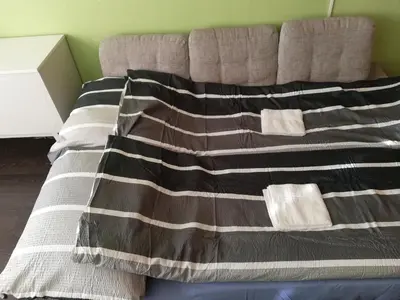 Ein Bett oder Betten in einem Zimmer der Unterkunft Appartement Schneerose