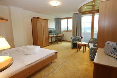 Ein Bett oder Betten in einem Zimmer der Unterkunft Hotel Neuwirt