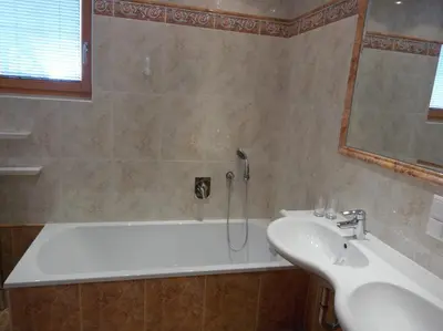 Ein Badezimmer in der Unterkunft Hotel Neuwirt