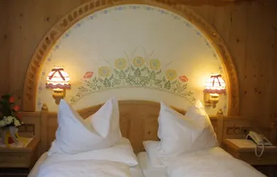 Ein Bett oder Betten in einem Zimmer der Unterkunft Hotel Neuwirt