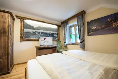 Ein Bett oder Betten in einem Zimmer der Unterkunft Landgasthof & Restaurant Batzenhäusl