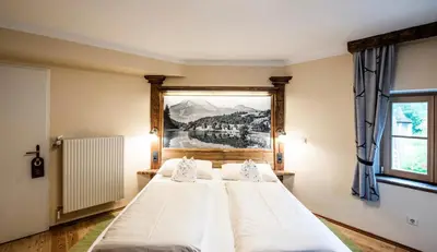 Ein Bett oder Betten in einem Zimmer der Unterkunft Landgasthof & Restaurant Batzenhäusl