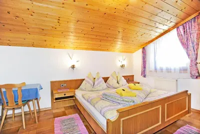 Ein Bett oder Betten in einem Zimmer der Unterkunft Ferienwohnungen Haus Sonnenschein
