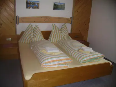 Ein Bett oder Betten in einem Zimmer der Unterkunft Ferienwohnungen Haus Sonnenschein