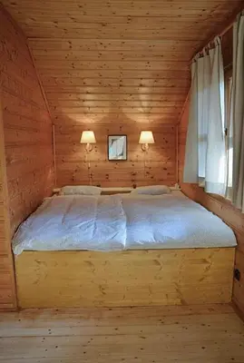 Ein Bett oder Betten in einem Zimmer der Unterkunft Ferienhaus Wagner