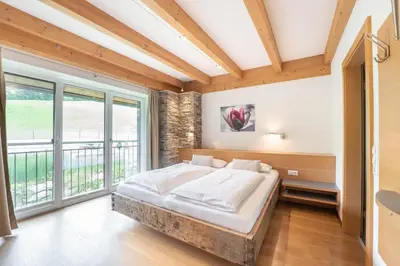 Ein Bett oder Betten in einem Zimmer der Unterkunft Residenz zur Hackenschmiede