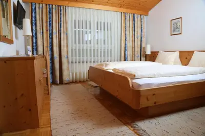 Ein Bett oder Betten in einem Zimmer der Unterkunft Gasthof Engelhof