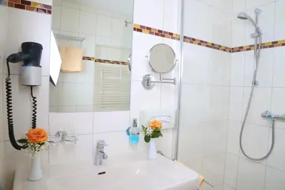 Ein Badezimmer in der Unterkunft Gasthof Engelhof