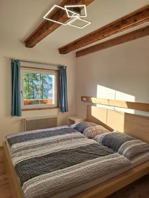 Ein Bett oder Betten in einem Zimmer der Unterkunft Lärchenreith Appartement
