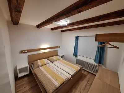 Ein Bett oder Betten in einem Zimmer der Unterkunft Lärchenreith Appartement