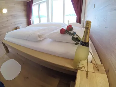 Ein Bett oder Betten in einem Zimmer der Unterkunft Ferienbungalow Mountain View Wood