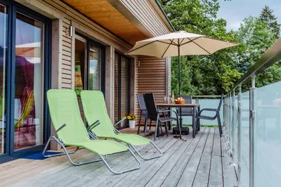Ein Balkon oder eine Terrasse in der Unterkunft Ferienbungalow Mountain View Wood