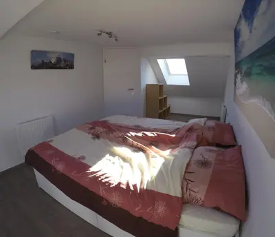 Ein Bett oder Betten in einem Zimmer der Unterkunft Haus Pistenblick