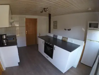 Küche/Küchenzeile in der Unterkunft Haus Pistenblick