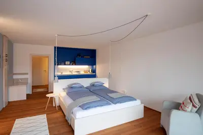 Ein Bett oder Betten in einem Zimmer der Unterkunft Frauscher Hafen-Apartments