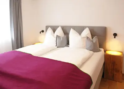 Ein Bett oder Betten in einem Zimmer der Unterkunft Appartementhaus Reiter Village Room