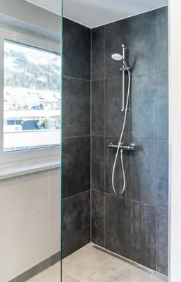 Ein Badezimmer in der Unterkunft Deluxe Appartement Berglust