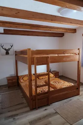 Ein Bett oder Betten in einem Zimmer der Unterkunft Seebachhaus