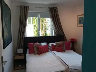 Ein Bett oder Betten in einem Zimmer der Unterkunft Schafberg Apartment