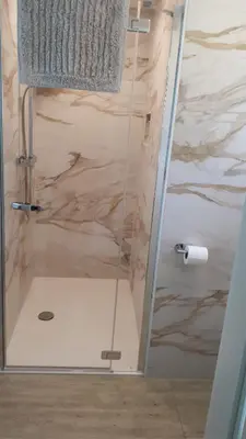 Ein Badezimmer in der Unterkunft Schafberg Apartment