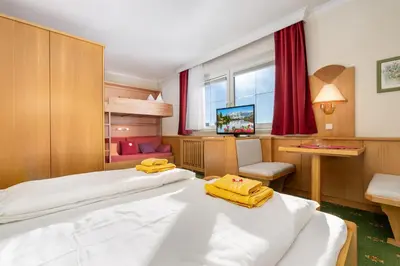Ein Bett oder Betten in einem Zimmer der Unterkunft Guesthouse Tauplitzalm