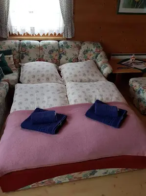 Ein Bett oder Betten in einem Zimmer der Unterkunft Ferienwohnung Arina