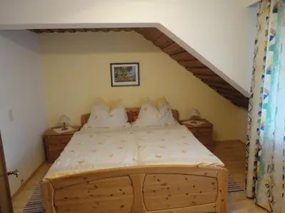 Ein Bett oder Betten in einem Zimmer der Unterkunft Bauernhof Strumegg