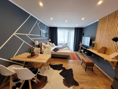 Ein Bett oder Betten in einem Zimmer der Unterkunft Alpine Studio with Indoor Pool & Spa included - 10 min from Hallstatt