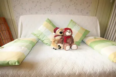 Ein Bett oder Betten in einem Zimmer der Unterkunft Sattelberg