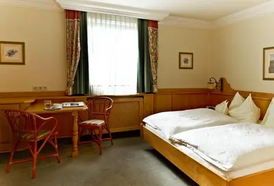 Ein Bett oder Betten in einem Zimmer der Unterkunft Hotel Lindner