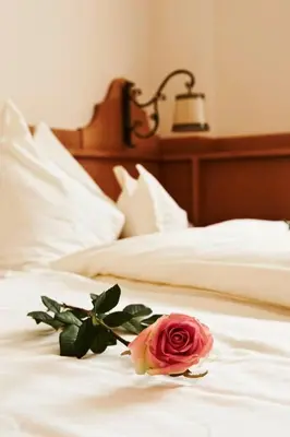 Ein Bett oder Betten in einem Zimmer der Unterkunft Hotel Lindner