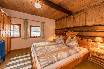 Ein Bett oder Betten in einem Zimmer der Unterkunft Bauernhütte Niedermaisgut