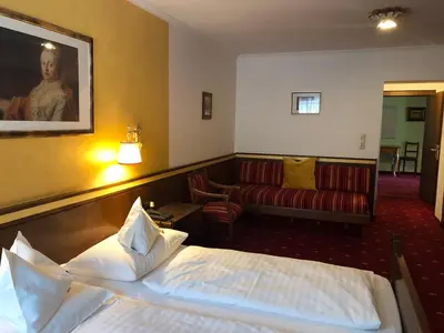 Ein Bett oder Betten in einem Zimmer der Unterkunft Landgasthof Santner