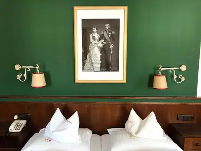 Ein Bett oder Betten in einem Zimmer der Unterkunft Landgasthof Santner
