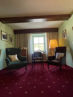 Ein Sitzbereich in der Unterkunft Landgasthof Santner