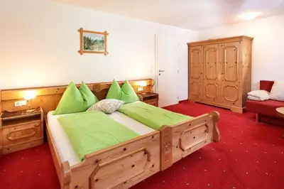 Ein Bett oder Betten in einem Zimmer der Unterkunft Appartement Königslehen