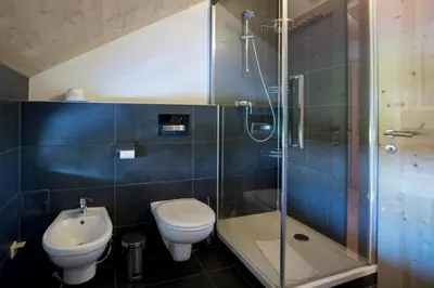 Ein Badezimmer in der Unterkunft Aron Chalet Kreischberg 10A
