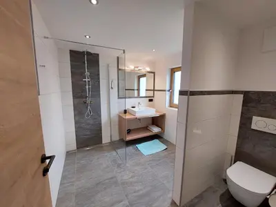 Ein Badezimmer in der Unterkunft Oberauhof Chalet